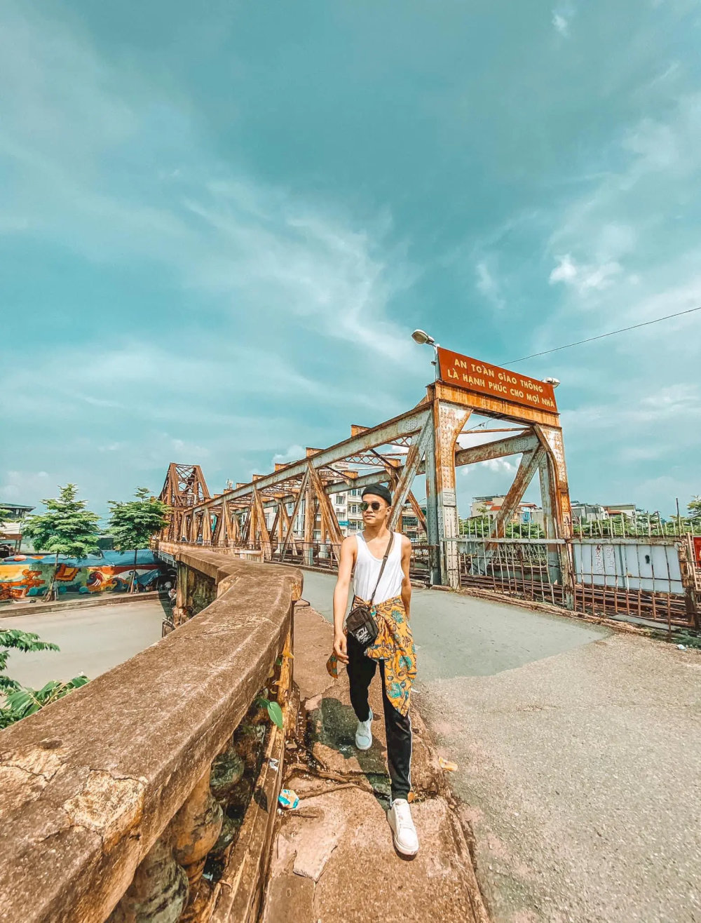 You can take photos of the entire bridge or with the Red River